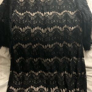 Dark blue laced dress with beige lining